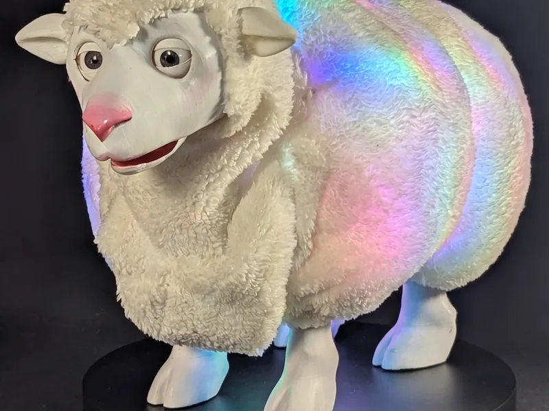 Illuminated sheep animatronic character on a display platform